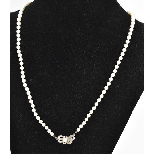 84 - A single strand Mikimoto cultured pearl necklace, with ninety-five spherical graduating cultured pea... 