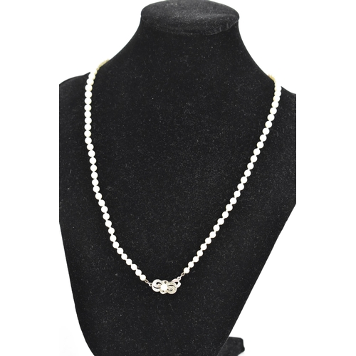 84 - A single strand Mikimoto cultured pearl necklace, with ninety-five spherical graduating cultured pea... 