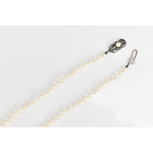 84 - A single strand Mikimoto cultured pearl necklace, with ninety-five spherical graduating cultured pea... 