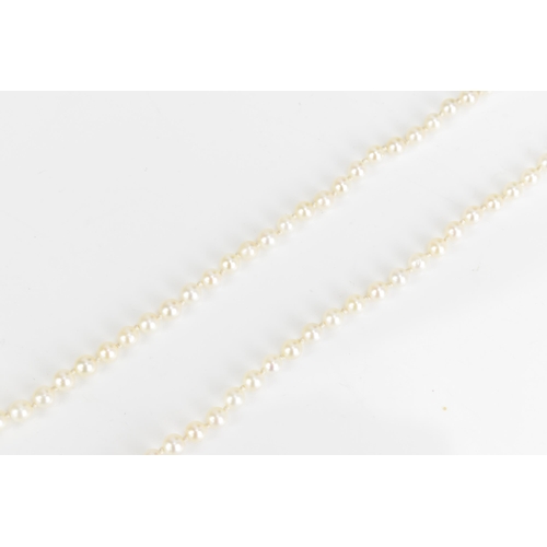 84 - A single strand Mikimoto cultured pearl necklace, with ninety-five spherical graduating cultured pea... 