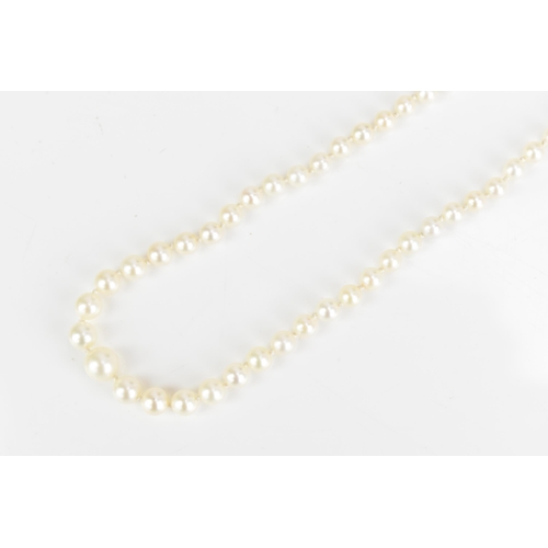 84 - A single strand Mikimoto cultured pearl necklace, with ninety-five spherical graduating cultured pea... 