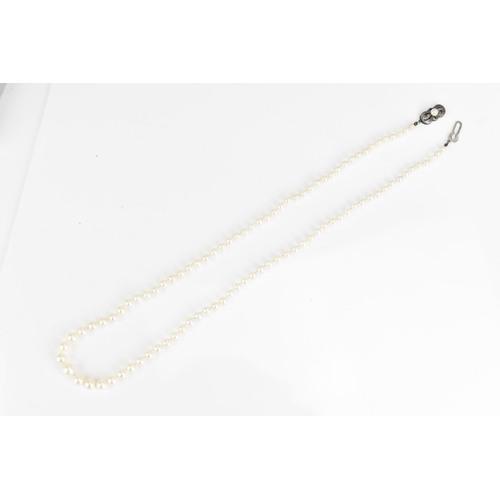 84 - A single strand Mikimoto cultured pearl necklace, with ninety-five spherical graduating cultured pea... 