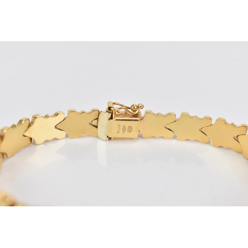 85 - An Italian UnoAerre 18ct gold fancy link bracelet, with an open box clasp, stamped 750, 18cm, 13.1 g... 