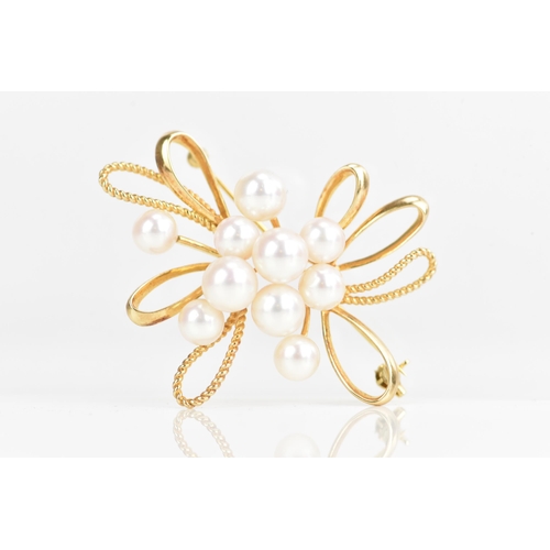 86 - A Mikimoto 14ct yellow gold pearl spray brooch, set with ten cultured pearls, 50.8mm x 43.1mm, 11.7 ... 