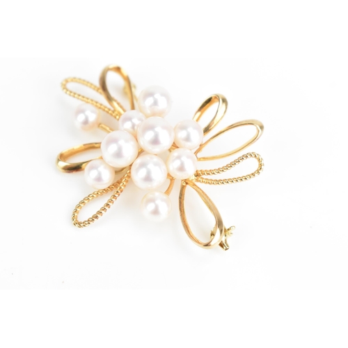 86 - A Mikimoto 14ct yellow gold pearl spray brooch, set with ten cultured pearls, 50.8mm x 43.1mm, 11.7 ... 