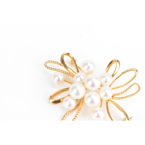 86 - A Mikimoto 14ct yellow gold pearl spray brooch, set with ten cultured pearls, 50.8mm x 43.1mm, 11.7 ... 