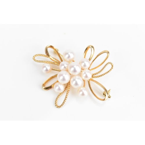 86 - A Mikimoto 14ct yellow gold pearl spray brooch, set with ten cultured pearls, 50.8mm x 43.1mm, 11.7 ... 