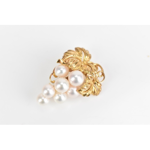 87 - A Mikimoto 14ct yellow gold brooch, fashioned as a bunch of grapes with seven cultured pearls, 32.6m... 