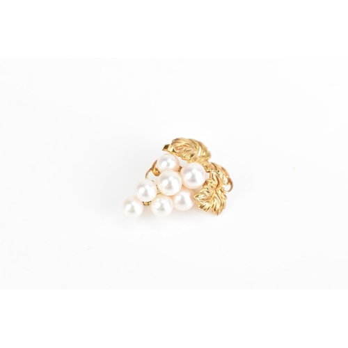 87 - A Mikimoto 14ct yellow gold brooch, fashioned as a bunch of grapes with seven cultured pearls, 32.6m... 