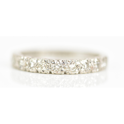 88 - An 18ct white gold half eternity ring, with ten illusion set diamonds, ring size N, 3.4 grams
If the... 