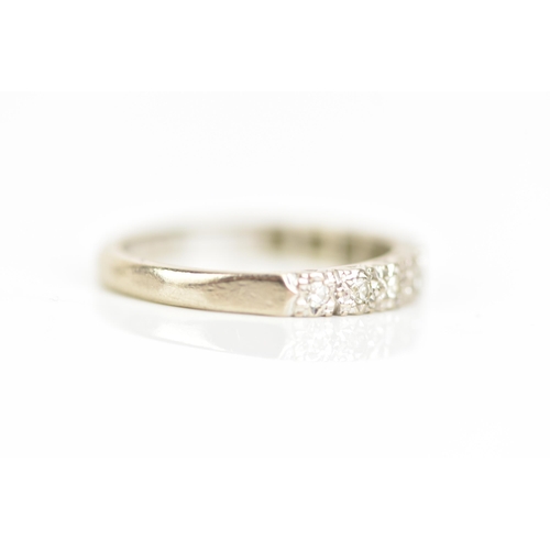 88 - An 18ct white gold half eternity ring, with ten illusion set diamonds, ring size N, 3.4 grams
If the... 