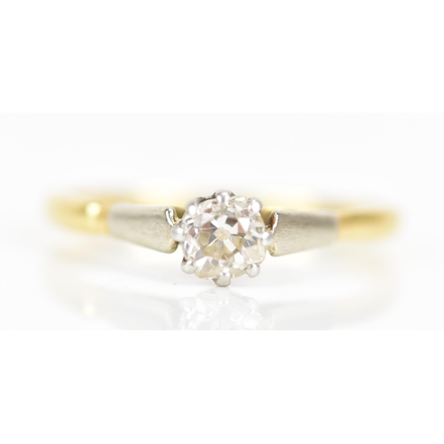 89 - A yellow and white gold diamond engagement ring, the old cut diamond in an eight claw setting, 4.2mm... 