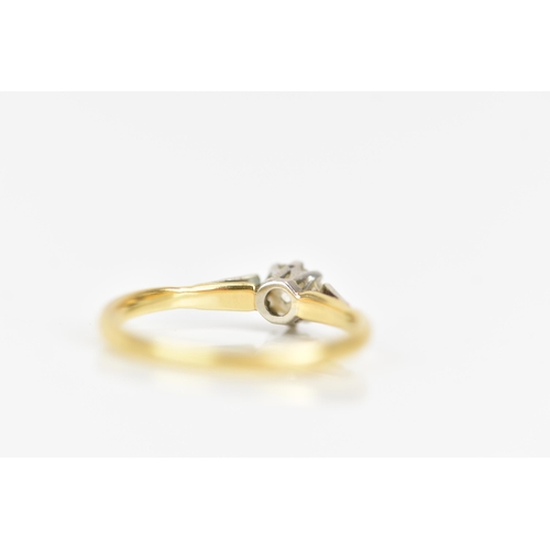 89 - A yellow and white gold diamond engagement ring, the old cut diamond in an eight claw setting, 4.2mm... 