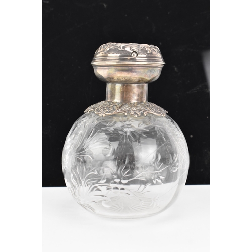 9 - An Edwardian silver topped dressing table bottle, by Charles Boyton (III), hallmarked London 1902, h... 