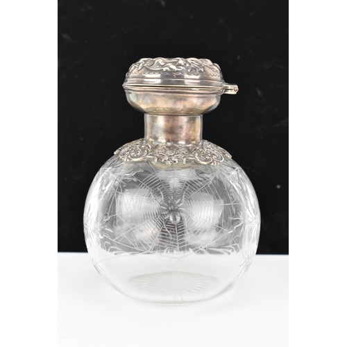 9 - An Edwardian silver topped dressing table bottle, by Charles Boyton (III), hallmarked London 1902, h... 