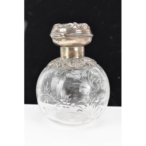 9 - An Edwardian silver topped dressing table bottle, by Charles Boyton (III), hallmarked London 1902, h... 