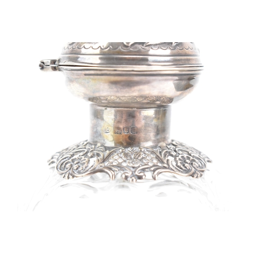 9 - An Edwardian silver topped dressing table bottle, by Charles Boyton (III), hallmarked London 1902, h... 