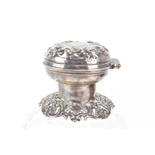 9 - An Edwardian silver topped dressing table bottle, by Charles Boyton (III), hallmarked London 1902, h... 