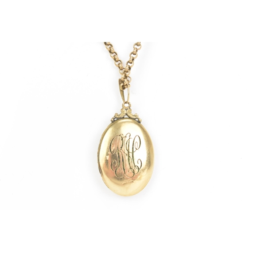 93 - A 9ct gold belcher chain link necklace and gold plated locket, the locket engraved with initials to ... 