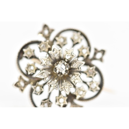 98 - A Victorian gold and white metal diamond floral brooch, the flowerhead en tremblant with central dia... 