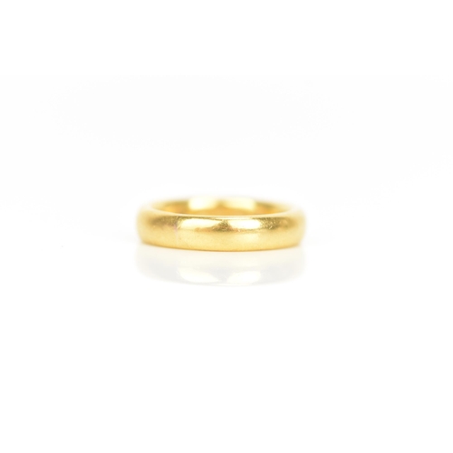 99 - A 22ct yellow gold wedding band, ring size J 1/2, 7.9 grams
If there is no condition report shown, p... 