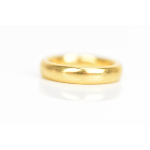 99 - A 22ct yellow gold wedding band, ring size J 1/2, 7.9 grams
If there is no condition report shown, p... 