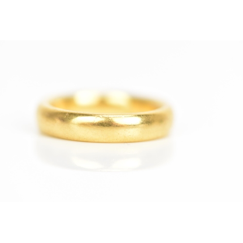 99 - A 22ct yellow gold wedding band, ring size J 1/2, 7.9 grams
If there is no condition report shown, p... 