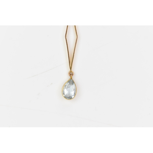 227 - An Edwardian 15ct gold aquamarine necklace, the pendant having a brilliant cut aquamarine, 5.5mm, se... 