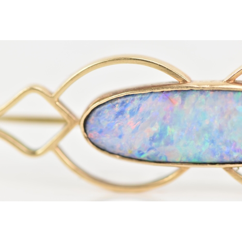 243 - A 9ct yellow gold and opal brooch, the oval opal 25.8mm x 7.7mm set in a pierced frame, stamped 9ct,... 