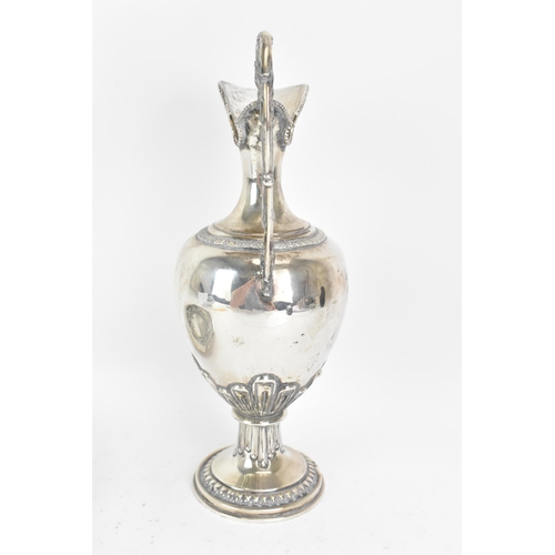 244 - An early 20th century continental white metal wine ewer and a tray, both stamped 900 KK, the ewer ha... 