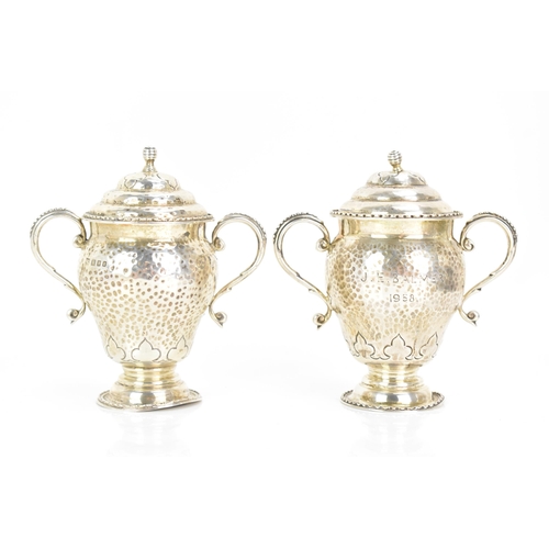 246 - Two Elizabeth II silver miniature trophies, one by D & J Wellby Ltd, hallmarked London 1955, the oth... 