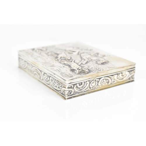 248 - A late 19th/early 20th century German 800 silver box, embossed with a hunting scene to the lid depic... 