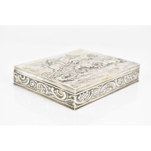 248 - A late 19th/early 20th century German 800 silver box, embossed with a hunting scene to the lid depic... 