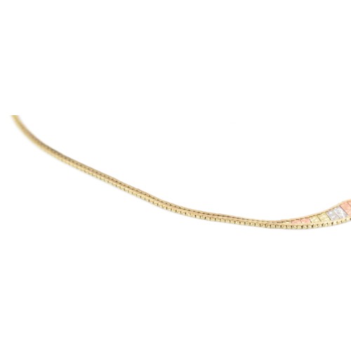 81 - A 9ct gold tri-coloured brick link choker necklace with a bracelet catch clasp, stamped 9KT 375, 41c... 