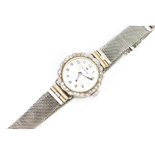 251 - A mid 20th century white metal ladies manual wind diamond cocktail watch, the silvered dial having A... 