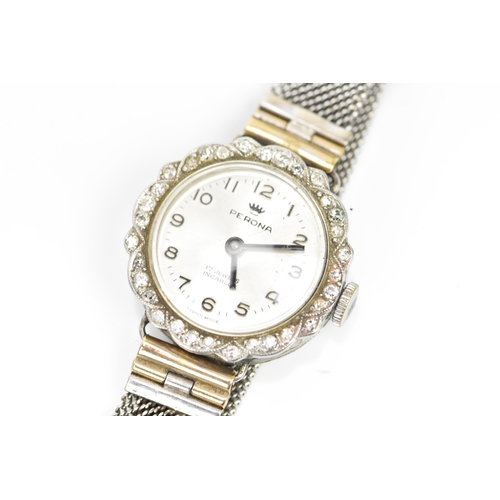 251 - A mid 20th century white metal ladies manual wind diamond cocktail watch, the silvered dial having A... 