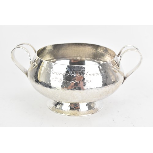 252 - An Edwardian silver Arts & Crafts bowl and spoon, by Stewart Dawson & Co Ltd, hallmarked London 1909... 