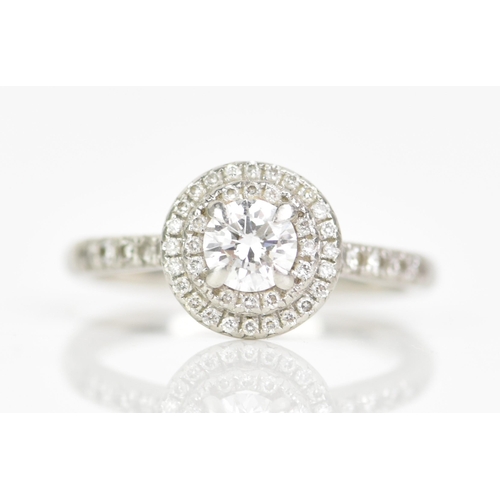 254 - A platinum and diamond engagement ring, the round brilliant cut diamond weighing 0.46ct, colour D, c... 