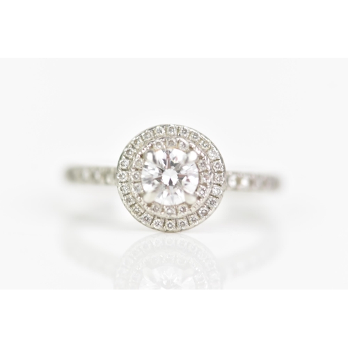 254 - A platinum and diamond engagement ring, the round brilliant cut diamond weighing 0.46ct, colour D, c... 