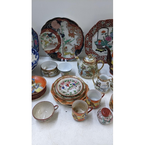 128 - A selection of oriental ceramics to include a Japanese Meiji plate, transfer printed bow, Noritake a... 