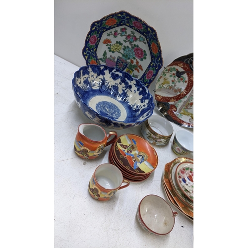 128 - A selection of oriental ceramics to include a Japanese Meiji plate, transfer printed bow, Noritake a... 