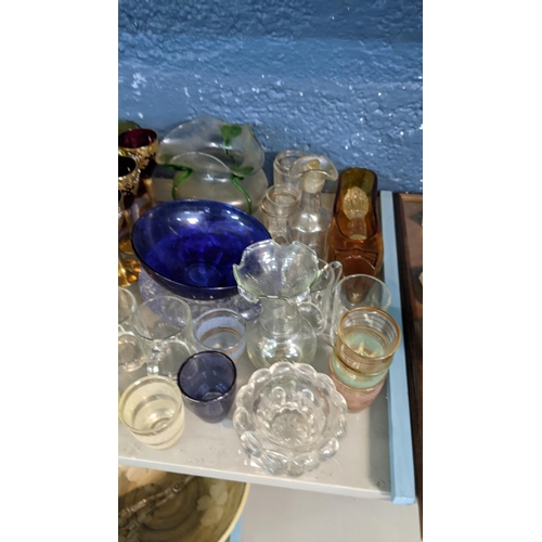 129 - Mixed glassware to include a Loetz vase, Bohemian glasses, an Empoli genie bottle and others
Locatio... 