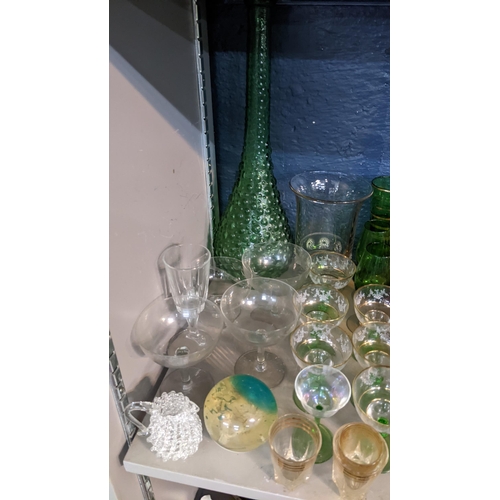 129 - Mixed glassware to include a Loetz vase, Bohemian glasses, an Empoli genie bottle and others
Locatio... 