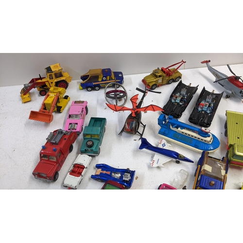 13 - Mixed loose toys to include a Corgi Batmobile with Batman and Robin, Matchbox and others
Location: L... 