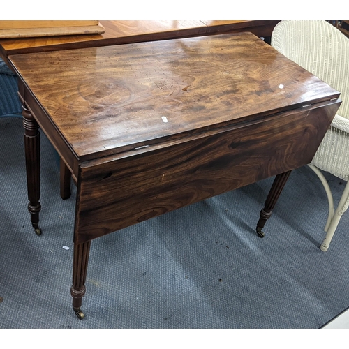 20 - An early 19th century mahogany single, fall flap table on reeded legs, 71.5h x 93.5w
Location: A2F
I... 