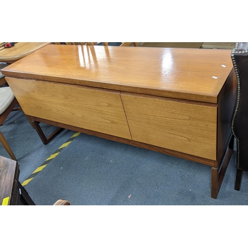 A mid 20th century teak sideboard with two fall flap doors, possibly by White & Newton, 73h x 152.5w
Location: STAIRS
If there is no condition report, please advise