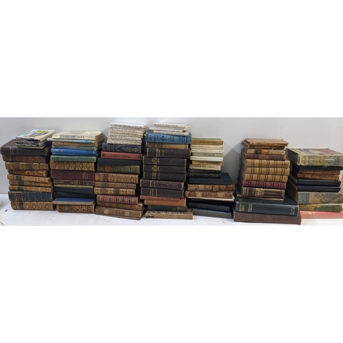 29 - A selection of books to include a set of AA Milne Winnie The Pooh books, Alice in Wonderland, Britai... 