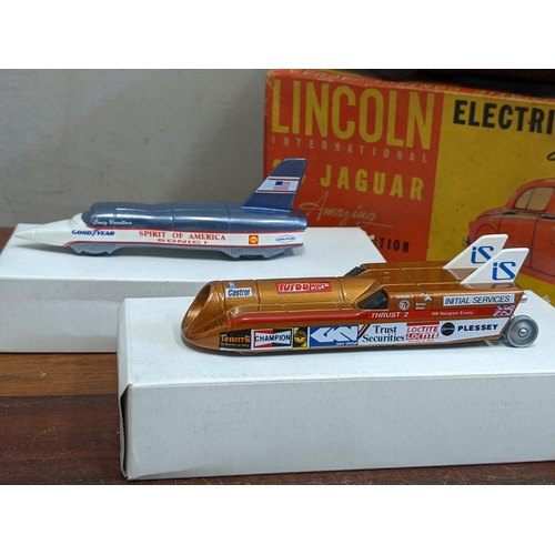 15 - A Lincoln International 2.4 Jaguar electric automatic control model boxed along with boxed models of... 