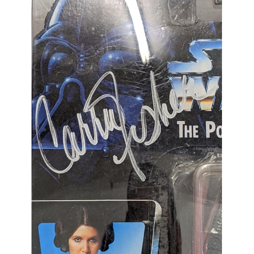 19 - A 1995 Kenner Star Wars Autographed The Power of The Force carded Princess Leia Organa action figure... 