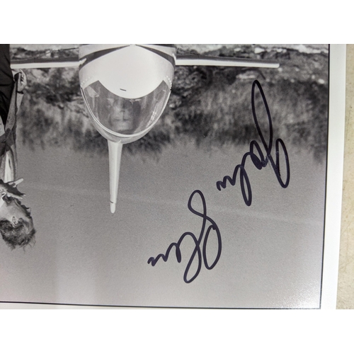 24 - Twelve signed James Bond related items to include a signed 10x8 photograph of Roger Moore and Fiona ... 